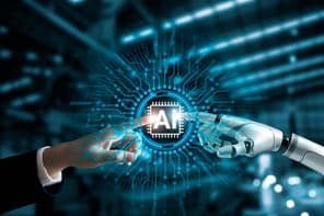 روبوٹ اور انسان کے ہاتھ AI سرکٹ بورڈ سے جڑتے ہیں۔